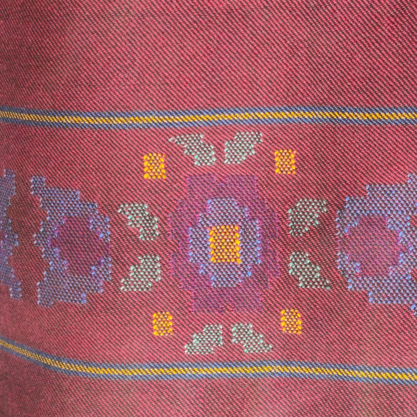 Close-up of maroon woolen suit for women