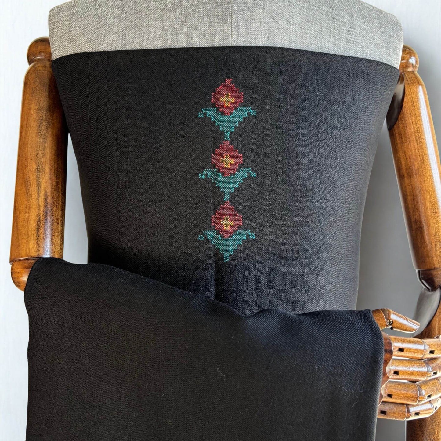closeup Front view of Bhuttico handwoven black polywool suit set for women