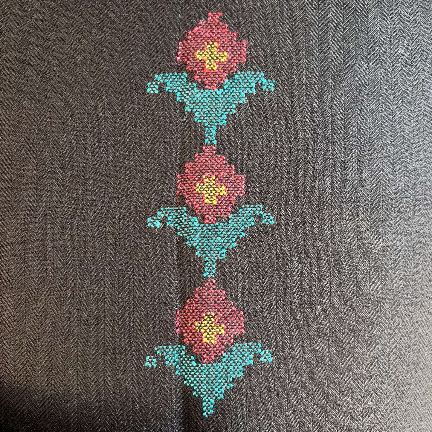 Close-up of design in black polywool from Bhuttico handloom suit set