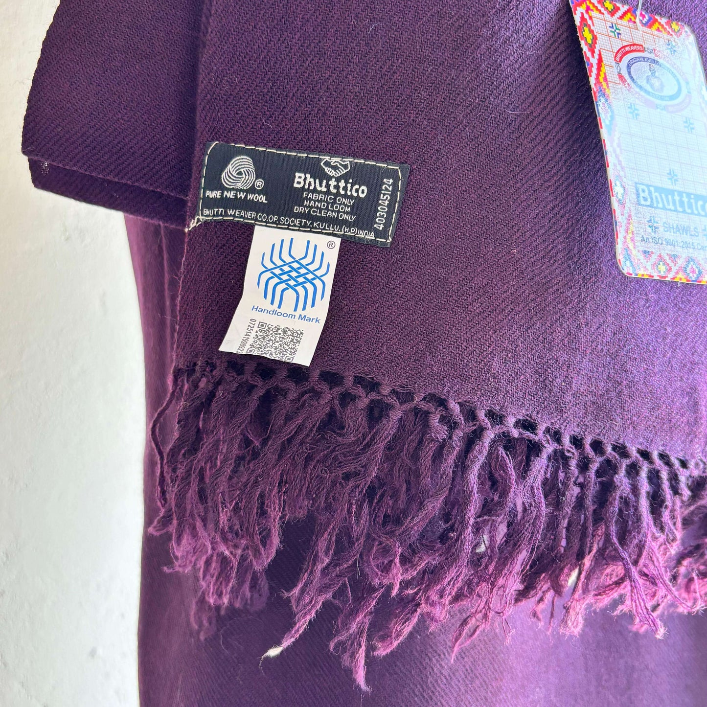 Soft Merino wool fabric texture of Bhuttico women’s plum handwoven suit set