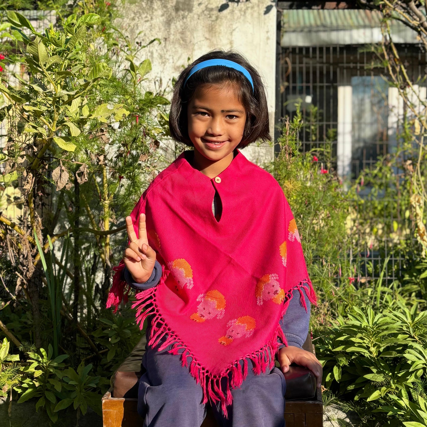 Handwoven Himachali merino wool kids poncho with tassel edges