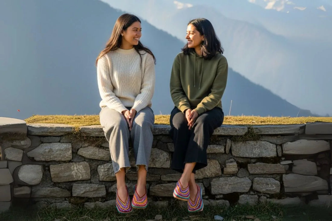 two women wearing pullas (Grass slippers)