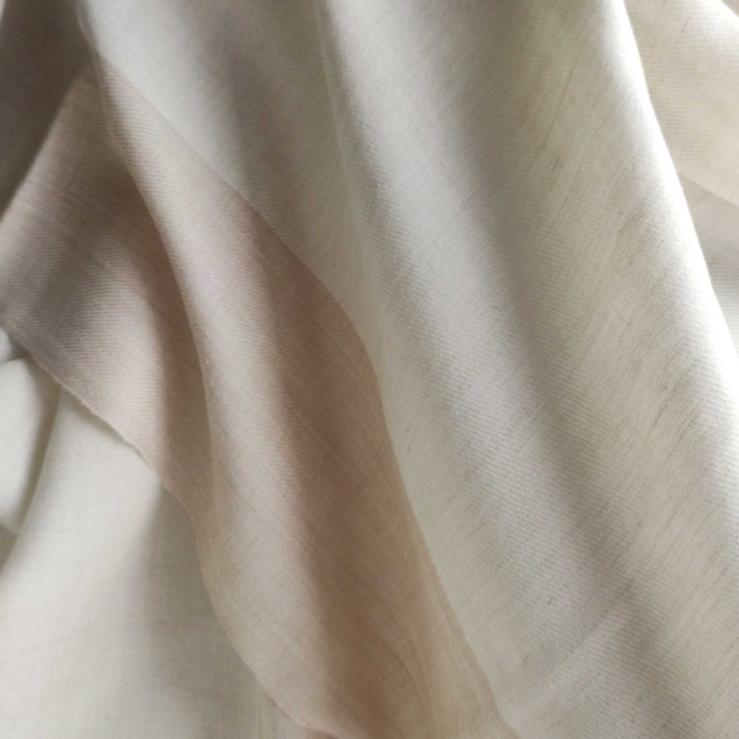 Close-up of beige Men's shawl(loi) with soft texture