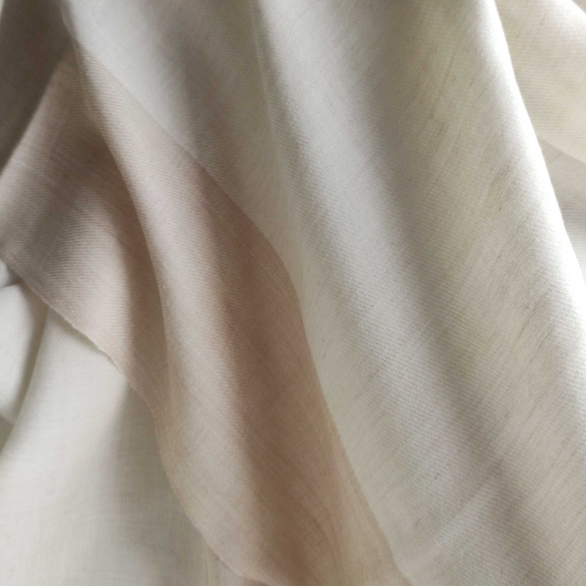 Close-up of beige Men's shawl(loi) with soft texture