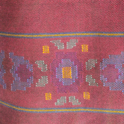 Close-up of maroon woolen suit for women 