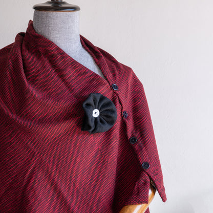 Maroon woolen cape for women closeup shot