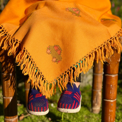Close up of Sunshine Car Kids Poncho in mustard yellow
